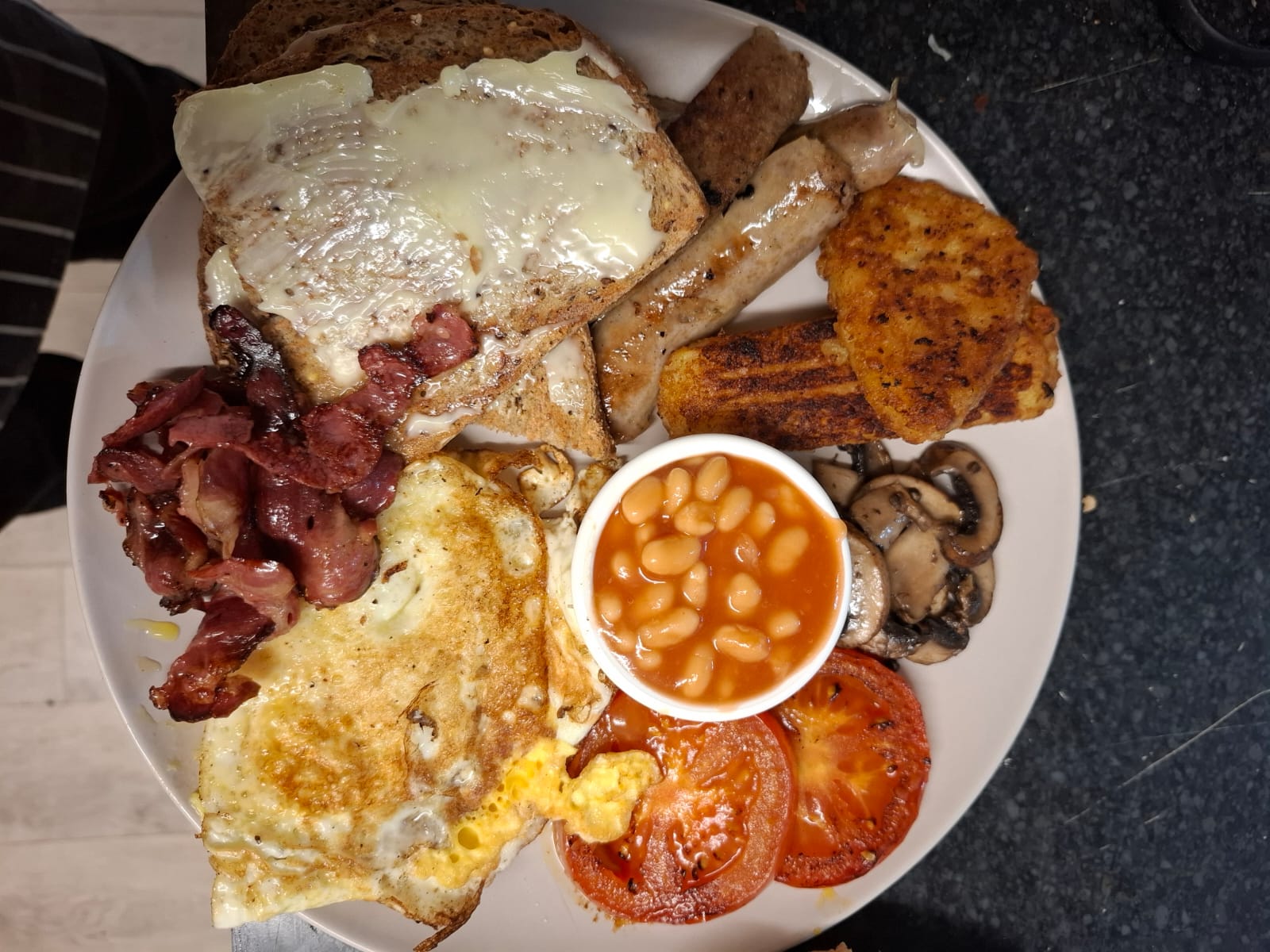 Full English breakfast with bacon, sausage, eggs, beans and toast at Connor's Cafe Wigston
